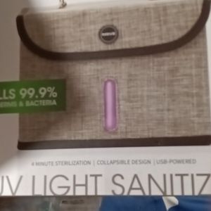 BRAND NEW NEVER OPENED SANITIZER